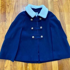 Like new. Girls navy cape.